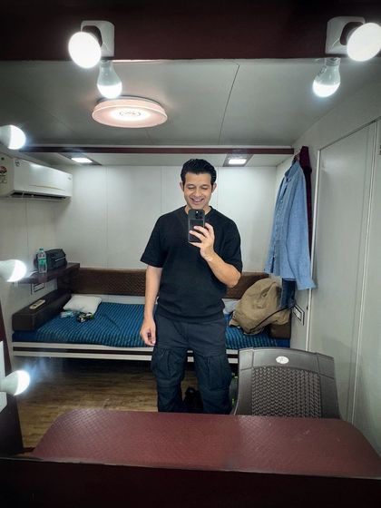 A classic vanity van selfie. The van is my home base on shoot days, where I prep, change, and relax between scenes.