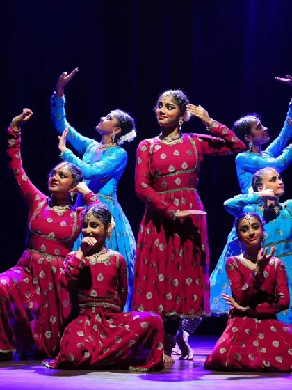 A closer look at the final formation from the 'ARAMBH' performance, showcasing the unity and grace of the entire group of dancers.