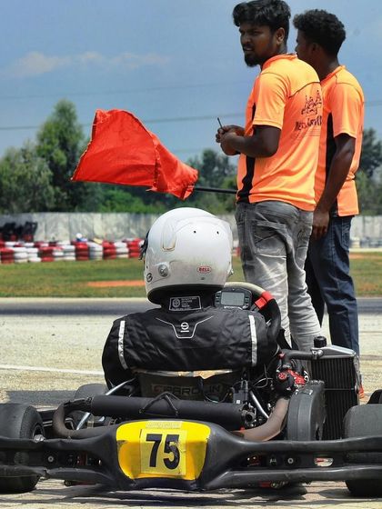 A red flag is shown during a race.