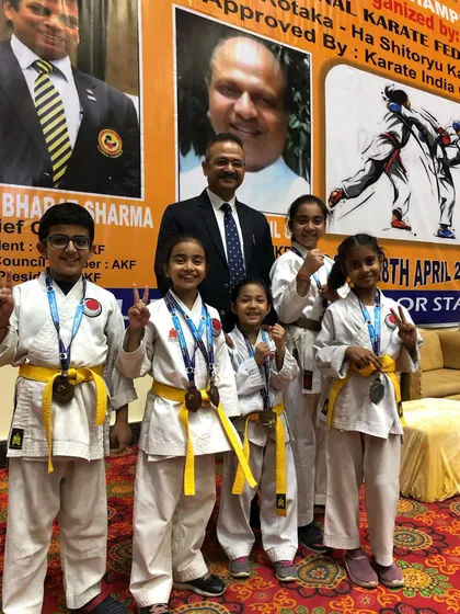 The rewards of dedication are tangible. I am proud to see my students' hard work recognized with medals at championships, a result of their commitment to consistent practice and the disciplined training we provide.