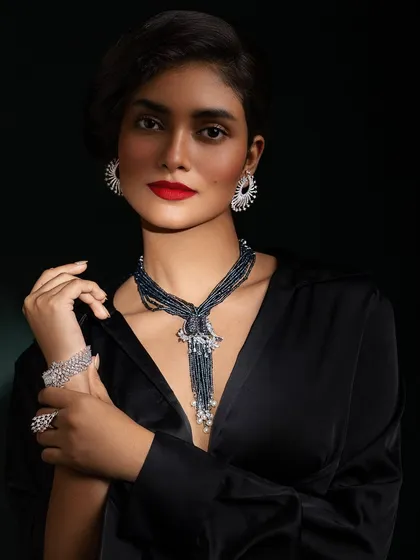 For this jewellery editorial, I styled model Shraddhaa Surve in a classic black satin shirt to create a sophisticated canvas for the diamond and beaded necklace.