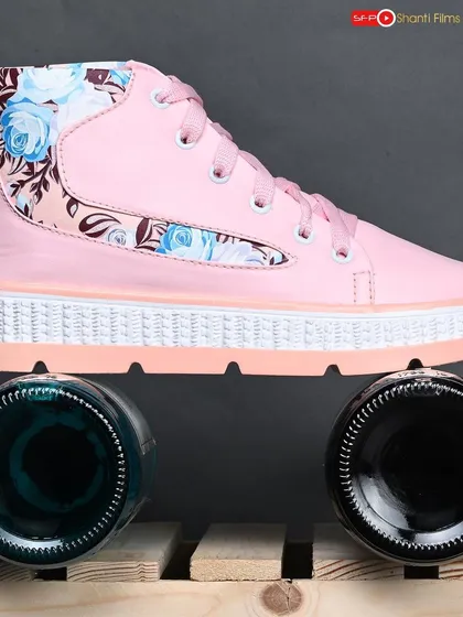 An unconventional and creative setup for a pair of women's sneakers. Using props like bottles and wooden crates, we create visually interesting compositions that grab attention.