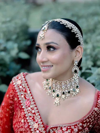A happy bride is the most beautiful bride. Her smile here is everything, and I'm so glad I could create a look that made her feel this confident and radiant on her big day.