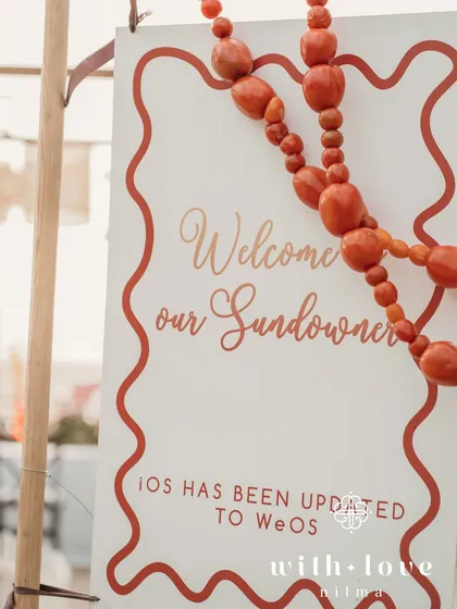 A close-up of the welcome sign for the sundowner, with its playful and personal message.