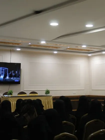 The setup for our Women Empowerment Workshop, where we use presentations and videos to discuss important topics related to safety and self-confidence.