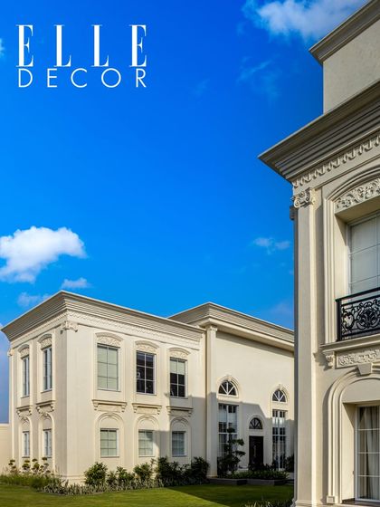 Featured in Elle Decor, the facade of The Grand Alabaster stands as a testament to neoclassical sophistication. The clean white exterior, combined with classical proportions and detailing, creates a timeless and majestic home.