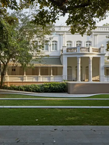 A full view of the restored Heritage House at the Kasturbhai Lalbhai Gallery, set within its manicured landscape. The project demonstrates our expertise in large-scale architectural conservation and landscape integration.