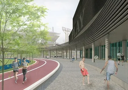 Movement is central to the design of the MCA Sports Block. This view shows the dedicated running track alongside the shaded walkway, illustrating how I design spaces that actively encourage wellness and connection, with the main stadium always visible in the background.