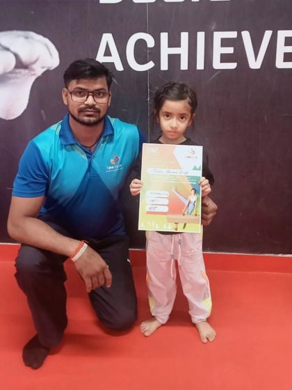 This young gymnast has earned her certificate, marking a new milestone in her training.