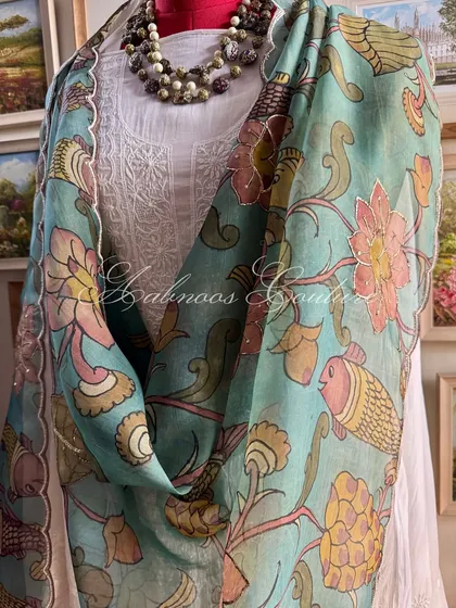 A mannequin shot showing how the Kalamkari dupatta can be draped for a dramatic and artistic look.