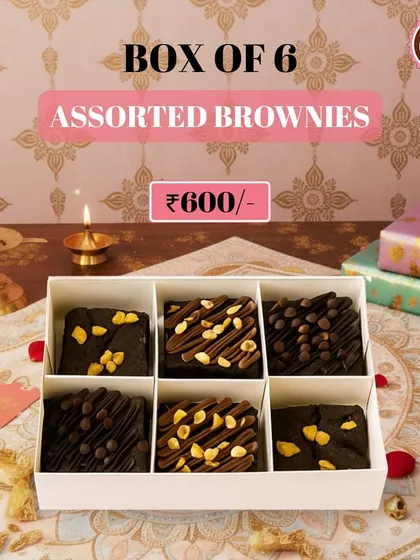 A closeup of my Box of 6 Assorted Brownies, a bestseller for any occasion. Each box contains a variety of fudgy, decadent brownies with different toppings, ensuring there's a favourite for everyone.