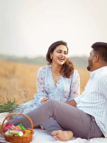 A moment of pure, candid laughter during the picnic shoot. These are the unscripted moments I strive to capture to show your genuine connection.