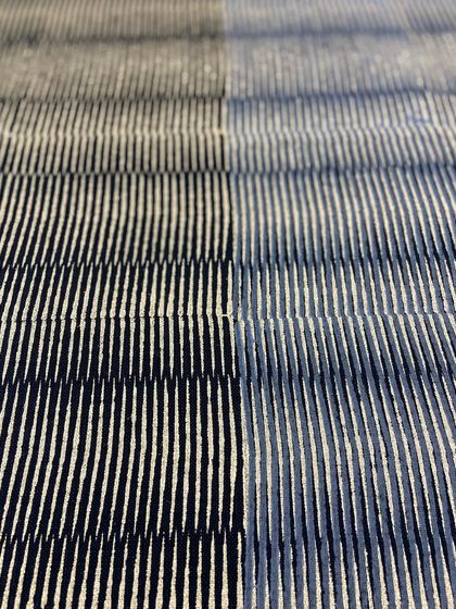 This mid-century modern settee is beautifully upholstered in our hand-printed linen. The 'Sonoma' pattern in Glitter Graphite, designed by Seema Krish, creates a unique texture with its striking yet muted metallic gold on black.