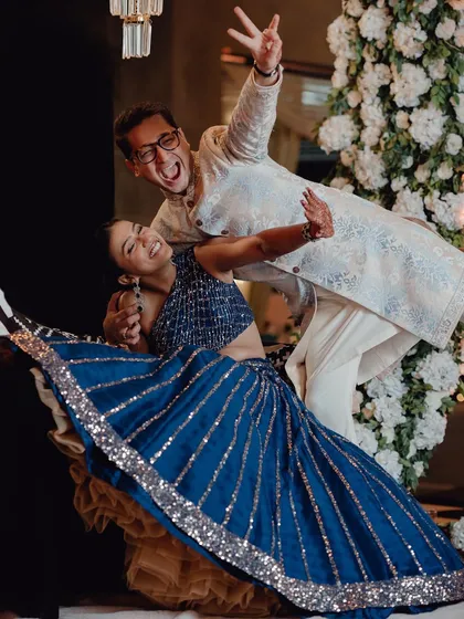 A high-energy dance performance from the Sangeet night, with the couple showing off their moves in a perfectly coordinated and joyful dip.