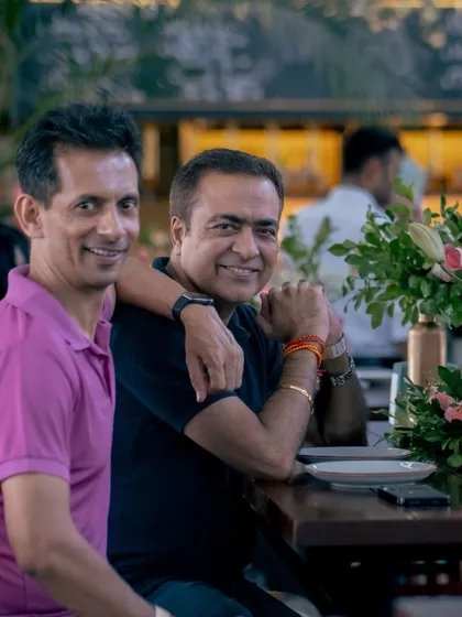 Friends enjoying each other's company at our Golden Circle event, where new friendships bloom over great food and drinks.