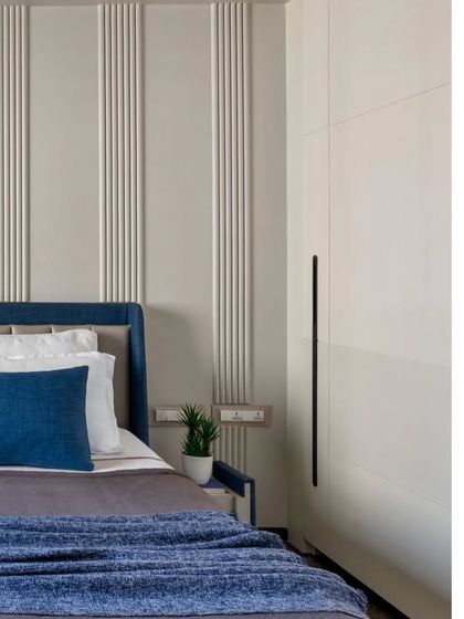 A closer view of the paneled wall and hidden side table storage. Every detail is designed to be both beautiful and practical.