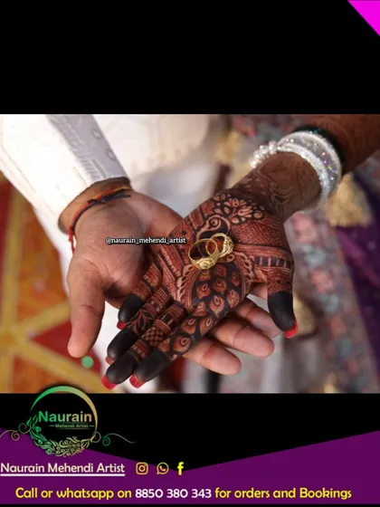 The perfect shot. A deep, dark henna stain provides a beautiful contrast for the wedding rings, symbolizing the start of a new journey.