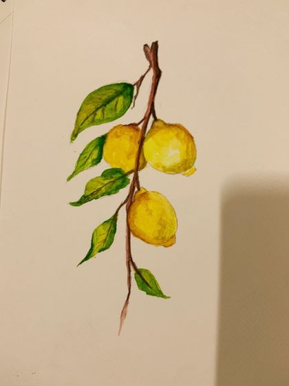A finished watercolor painting of lemons on a branch. Our specialized courses help you develop the focus and technique needed to create realistic and vibrant artworks.