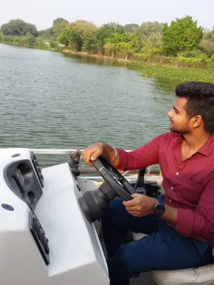 Taking the wheel for a boat ride on one of Bengaluru's many lakes.