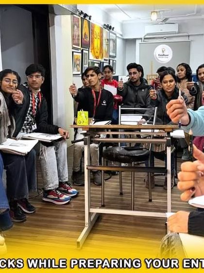 Our instructor giving tips and tricks to students preparing for their BFA entrance exams, focusing on techniques to improve speed and accuracy.