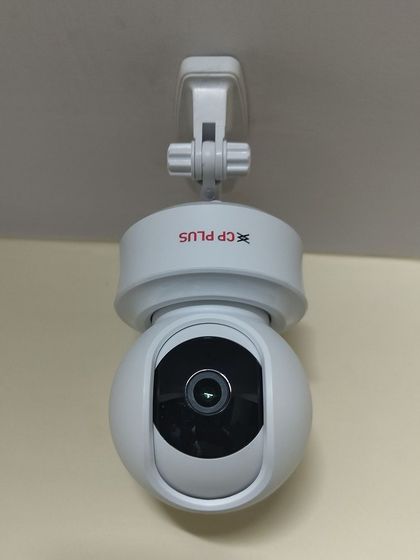 A ceiling-mounted CP-E31A Wi-Fi PT (Pan-Tilt) camera. This type of mounting gives a great overhead view of the entire room.