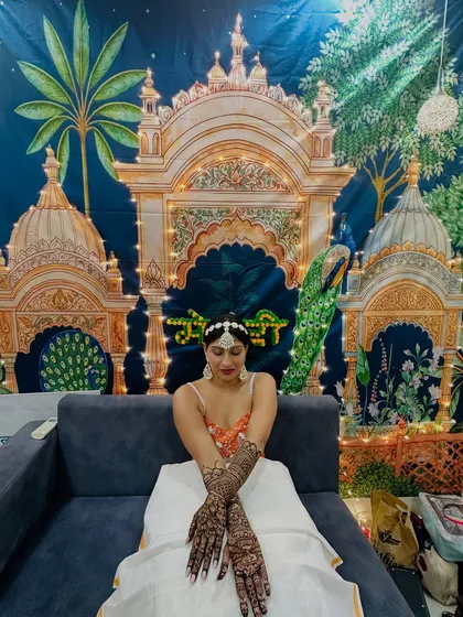 A happy bride is the most beautiful bride. It's my greatest joy to see you shine, adorned with mehndi that tells your story against a backdrop of celebration.