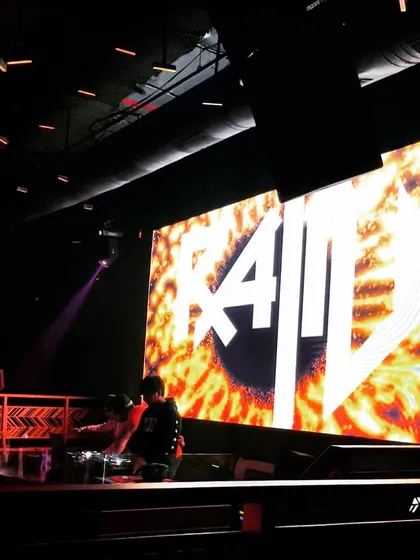 My logo lighting up the big screen behind the DJ console. This is the view from the stage when the whole club is locked into the music.