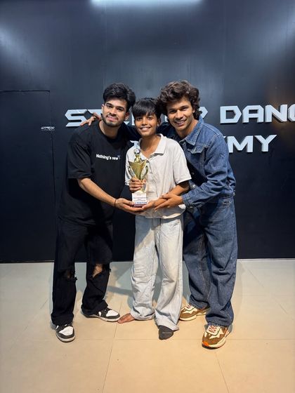 Celebrating a big win with one of our dedicated students. His performance was a highlight of the competition.