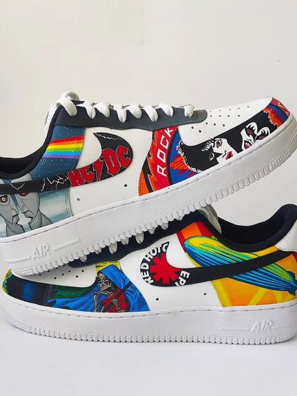 A shot showing both shoes of the Rock and Roll AF1s. It's a mismatched yet perfectly in-sync pair that tells the story of classic rock.