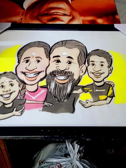 A commissioned family portrait of four, framed and ready to be displayed. You can send me individual photos and I can combine them into a single group illustration.