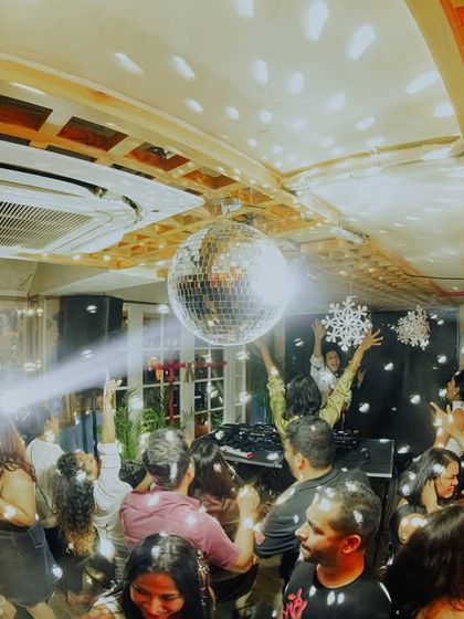 The disco ball works its magic at Monkey Bar, creating a classic party atmosphere that's perfect for my throwback sets.