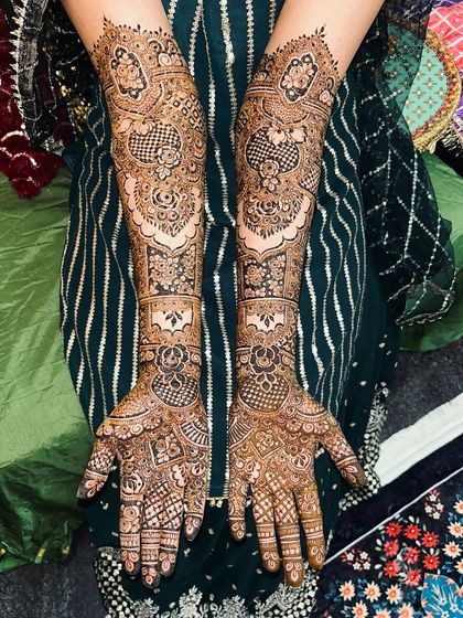 A classic bridal design featuring a mix of geometric and floral patterns. The coverage is full and the details are incredibly fine.