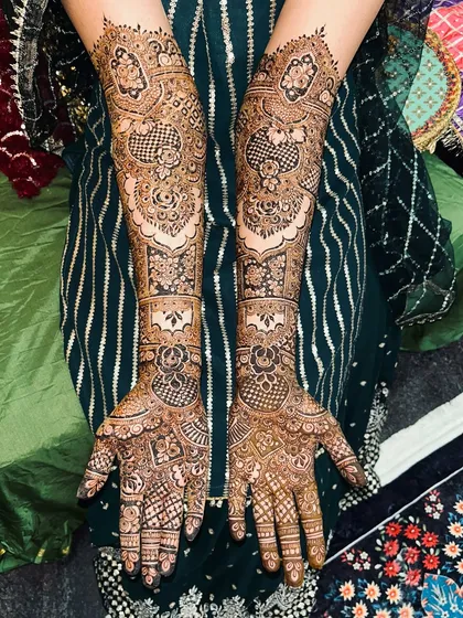 A classic bridal design featuring a mix of geometric and floral patterns. The coverage is full and the details are incredibly fine.