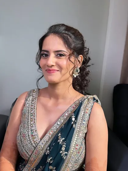 A portrait of my bride's Sangeet look. The makeup is soft yet defined, ensuring she looks stunning all night long.