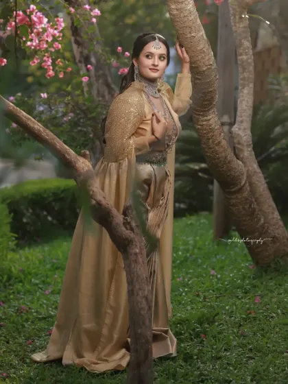 A collection of portraits featuring a model in a golden-hued traditional outfit, shot outdoors. The natural light and garden setting add a soft, ethereal quality to these elegant images.