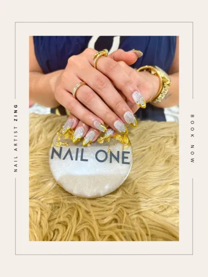 Created by our artist Zing, this design is all about texture and shine. We used a shattered glass effect with gold foil over a milky white base to create a sophisticated and modern look that is perfect for a special occasion.