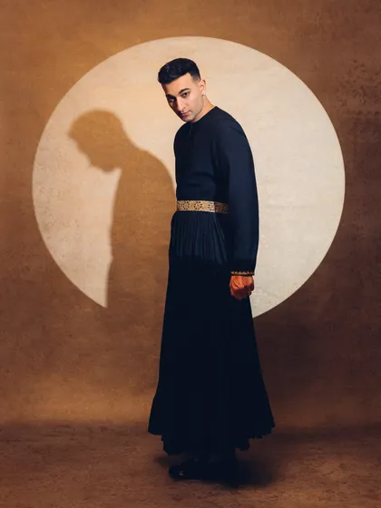 A full-length portrait with my shadow. This shot plays with light and silhouette to create a strong, artistic statement.