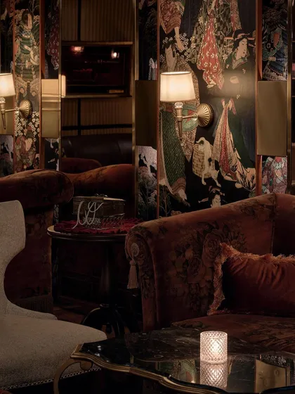 In the award winning ZLB23 speakeasy, we created intimate seating nooks that draw guests into the story. The design layers rich textures, from velvet sofas to a custom Japanese graphic wallpaper, to build a sophisticated and mysterious atmosphere perfect for a hidden jazz and cocktail bar.