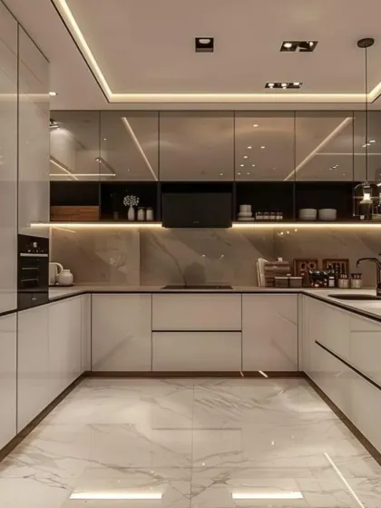 This kitchen combines glossy white and grey cabinets with a marble-patterned floor and backsplash. We incorporated vertical glass display units and strategic ceiling lighting to create a sense of depth and luxury in this modern U-shaped layout.