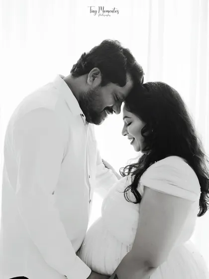 A timeless black and white portrait that strips away all distractions, focusing purely on the joy and intimacy shared between you and your partner.