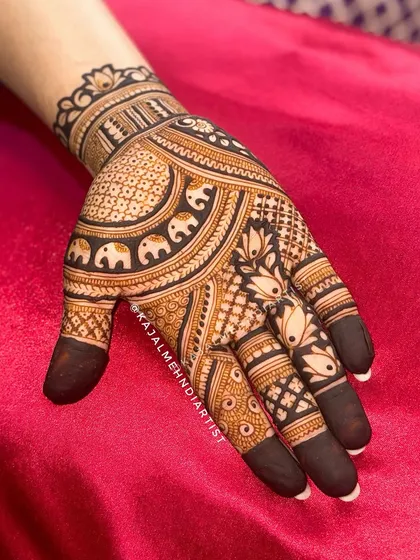 A close-up of the palm with the elephant and lotus design.