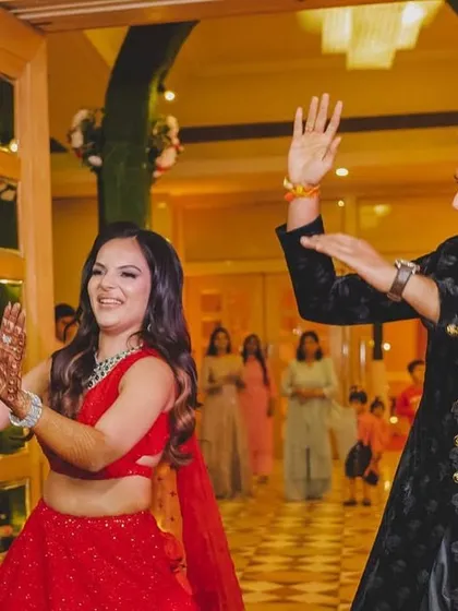 A fun, interactive sangeet entry where the couple dances through the crowd. It's a great way to get everyone involved from the very beginning.