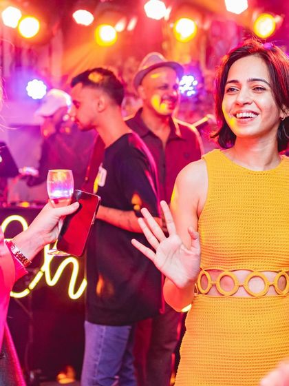 A guest enjoying the vibe at a private party. It's great to see everyone having a good time.