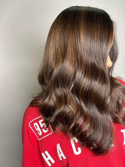 Another angle of the 'Irish Coffee Mocha' hair color. You can see the subtle highlights and how the different brunette shades work together to create a multi-dimensional effect.