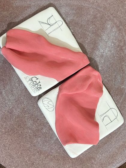 The beginning stages of the custom "dupatta" tiles. Here, I was sculpting the clay to mimic the folds of fabric, a key step in recreating the client's memory in a tactile, three-dimensional way.