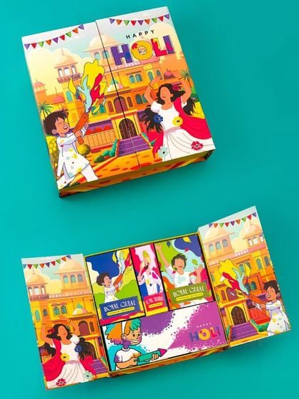 This innovative Holi box has a unique puzzle-like opening mechanism. Inside, it holds several pouches of 'Royal Gulal', making the unboxing experience as fun as the festival itself.