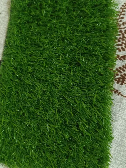 A close view of the 35mm artificial turf with double backing. This is a versatile, mid-range option suitable for balconies, patios, and gardens that see regular foot traffic.