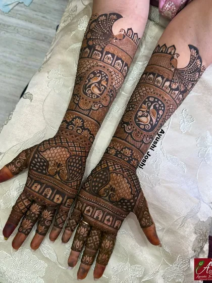 A gorgeous design for a 'Varshitap Tapasvi', a Jain religious observance. It features graceful peacocks and swans, symbolizing purity and devotion.