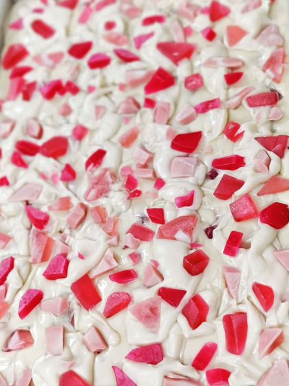 A "Rose Quartz" soap design, created by dropping rough-cut melt and pour embeds into a creamy white soap base.