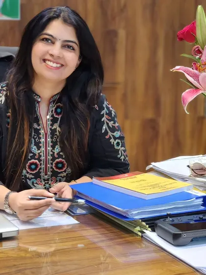 My partner, Parul Chaudhary, at our Ghaziabad office. We work as a team to ensure every detail of your case is thoroughly reviewed and prepared for litigation.
